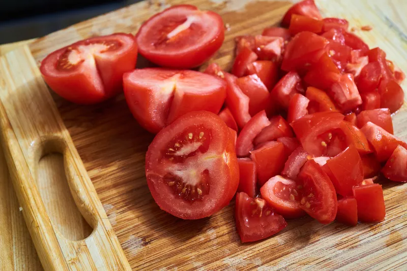 Chopped tomatoes on a cutting board