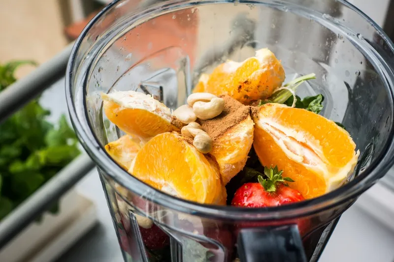 Fresh fruit in a blender jar